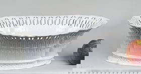 Creamware Pierced Reticulated Oval Chestnut Basket: 4 3/4" high, 14" wide, 9" deep. Firing crack.