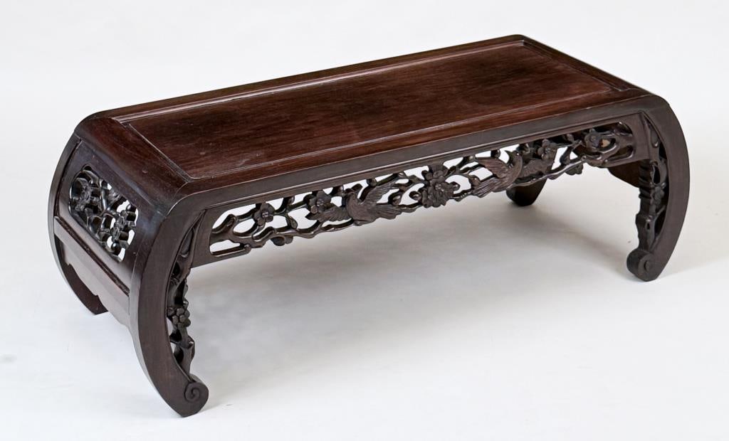 Chinese Carved Hardwood Low Table: arched legged form, pierced details, character marks to bottom. 14 1/2" high, 38" wide. Age and use wear.