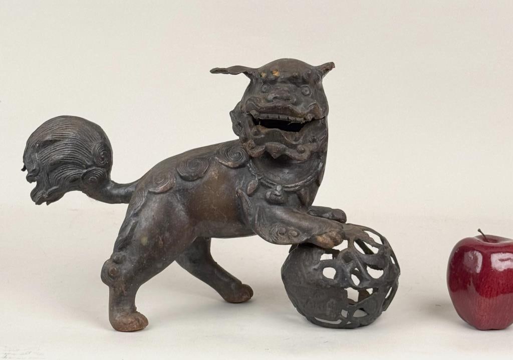 Chinese Cast Iron Foo Dog & Pierced Ball: 9 1/2" high, 14 1/2 wide, 4 1/2" deep. Oxidation, some rust.