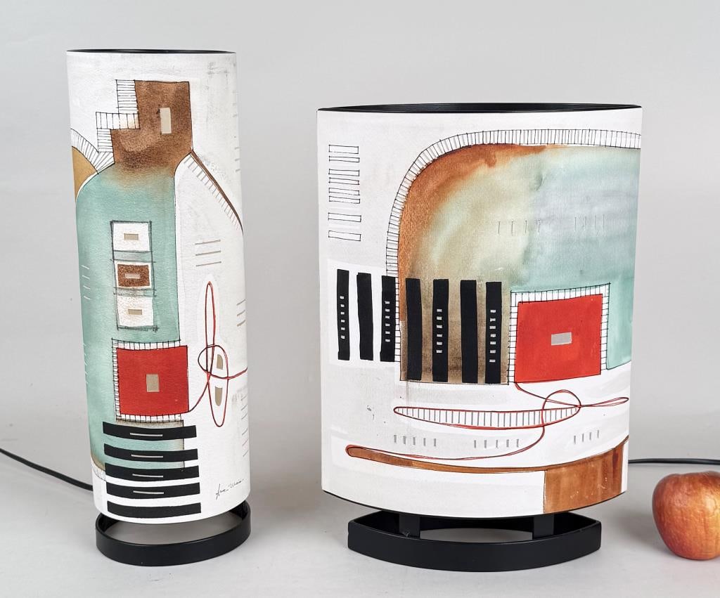 Two Ana Maia Native American Papercraft Lamps: both signed; titled "Acira 105" and "Acira 103". Larger: 14" high, 10" wide, 4 7/8" deep. Provenance: WA, Provincetown, MA.