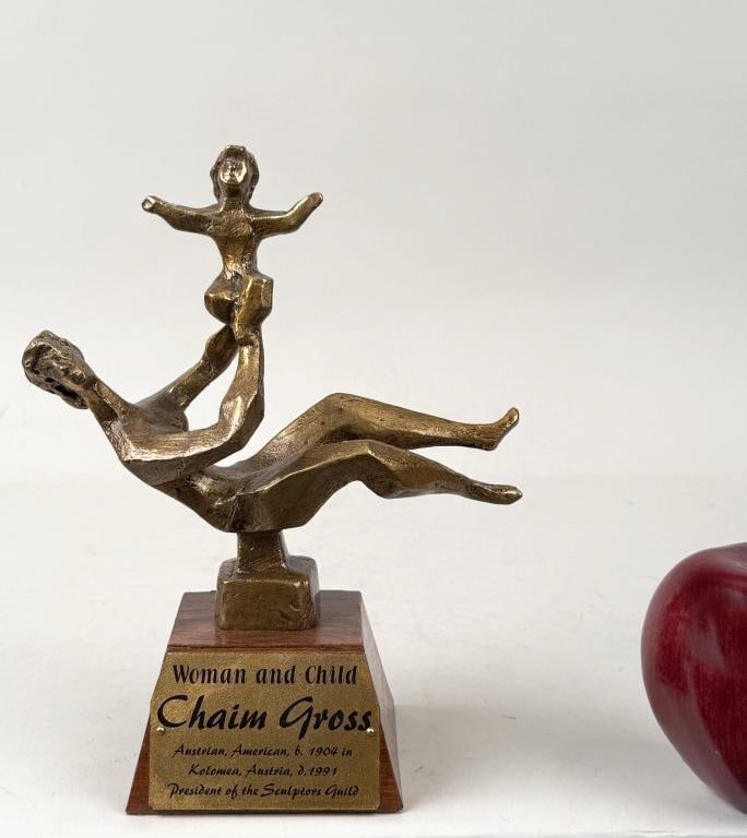 C. Gross, Bronze Sculpture Woman & Child: Chaim Gross (American, 1904-1991), bronze of woman holding her baby in the air, mounted on wooden base. Signed "Chaim Gross" on sculpture base. 9" high (6 3/4" excluding base), 7" wide, 3 1/2" deep. W