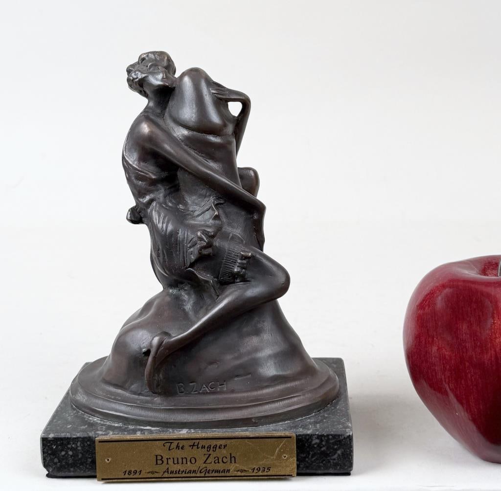 B. Zach, Bronze Sculpture "The Hugger": Bruno Zach (Austria/Ukraine, 1891-1945), woman holding phallus, mounted on stone base, signed "B. Zach" at base. 7" high, 5 1/2" wide, 3 1/2" deep. Stone chips.