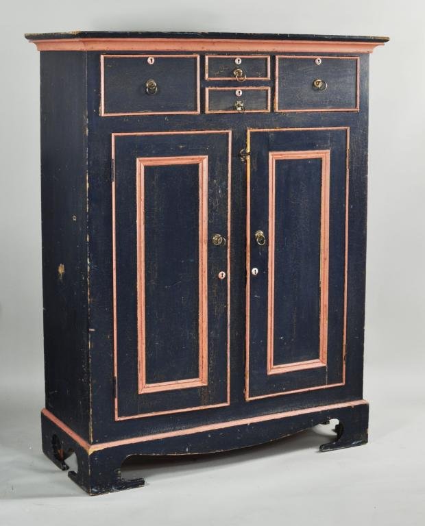 Blue & Salmon Painted Tall Chest, Late 19th C.: Blue and salmon painted tall chest, late 19th C., moulded cornice over two small narrow drawers flanked by larger drawers, two paneled doors below with two shelves in interior on bracket base. 62 1/2"