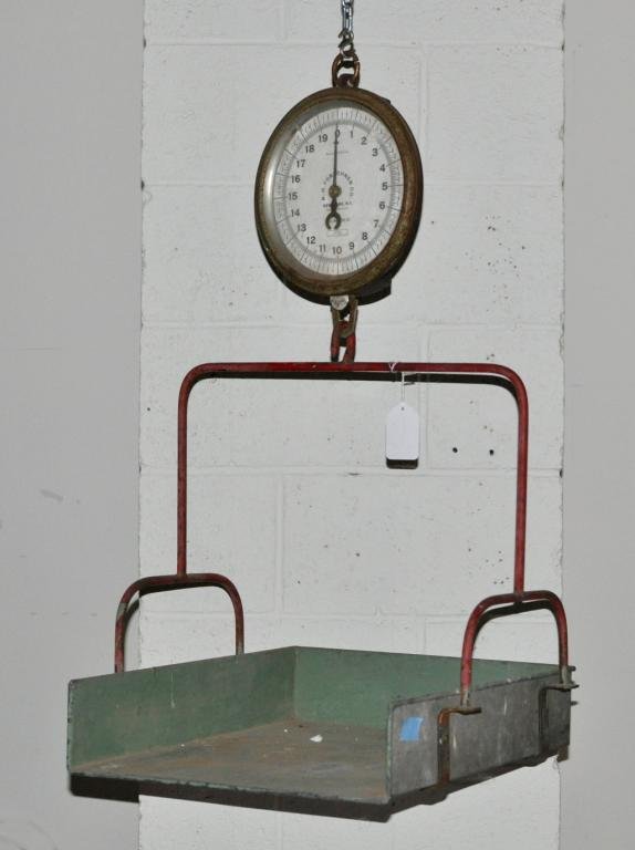 Painted Country Store Dry Goods Scale: Country store metal dry goods scale, 20th C., with green and red painted hanging balance tray. 21 1/2" high, 19" wide, 21 1/2" deep. Condition: chips, scratches, use wear. Provenance: The Aronson Coll