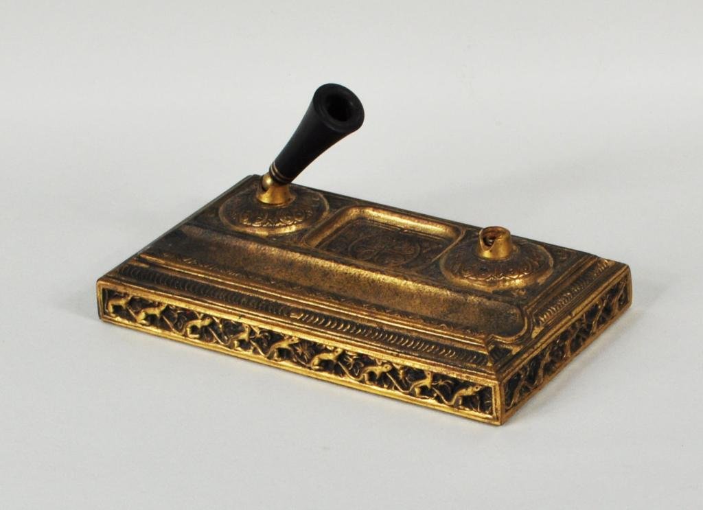 Tiffany Studios "Venetian" Pattern Pen Holder: Tiffany Studios “Venetian” pattern gilt bronze pen holder, with bronze dore finish and ermine motif border, impressed on underside “Tiffany Studios/New York 2171.” 1 1/2" high, 7 1/4" wide, 4 