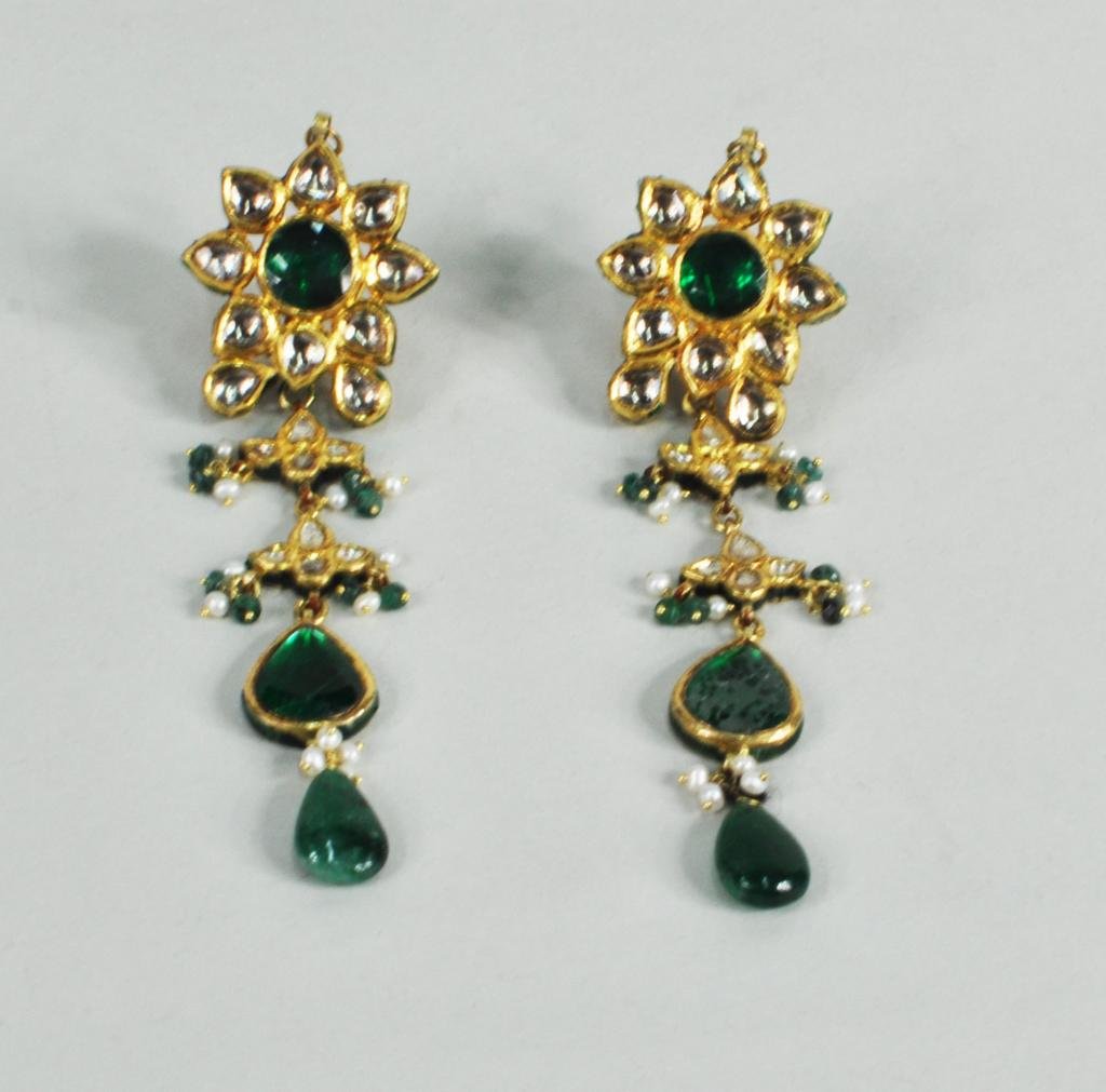 Pair Indian Mughal Style 20K Gold Earrings: Pair of Indian Mughal style 20K gold, foil backed diamonds, possibly emerald and seed pearl earrings, c. 1950, top with central round faceted emerald in a foil backed diamond surround with diamond, em