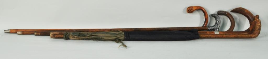 Four Wood Canes & An Umbrella