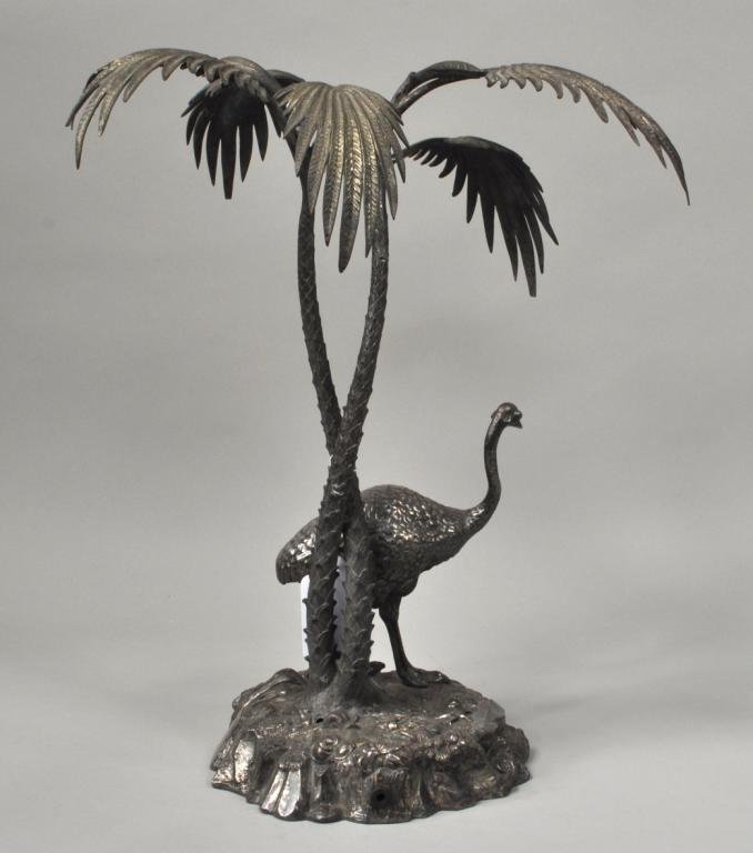 Victorian Figural Silver Plated Metal Lamp: Victorian figural silver plated metal lamp base of ostrich under palm trees, 19th C. 18" high, 12 1/2" wide. Condition: losses to palm trees.