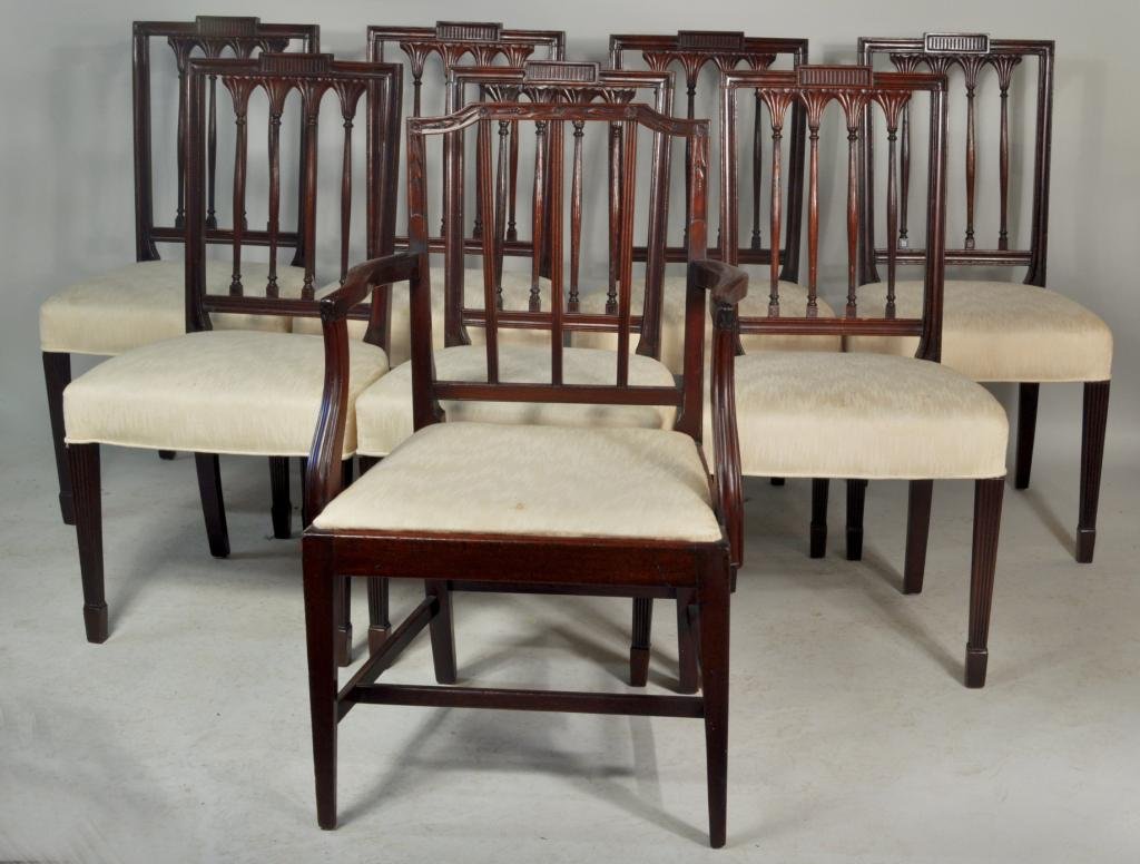 Set Eight Hepplewhite Style Dining Chairs: Fine set of seven Hepplewhite style carved mahogany dining chairs, late 19th century, in the manner of Slover & Taylor, New York, together with a George III carved mahogany arm chair. Side chairs: 36 