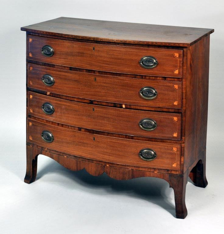 Hepplewhite Inlaid Mahogany Swell Front Chest: Hepplewhite inlaid mahogany four drawer swell front chest, with inlaid quarter fans and flaring french feet, Portsmouth area New Hampshire, circa 1800. 37" high, 41" wide, 22" deep. Condition: some re