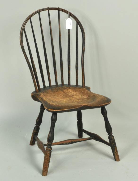 Windsor Bow Back Chair, Original Black Paint: Windsor bow back side chair, 19th C., in original black paint, with shaped seat on turned legs and stretchers. 34 1/2" high, 16 1/4" wide, 16 1/4" deep. Condition: extensive use, paint wear, loss, age