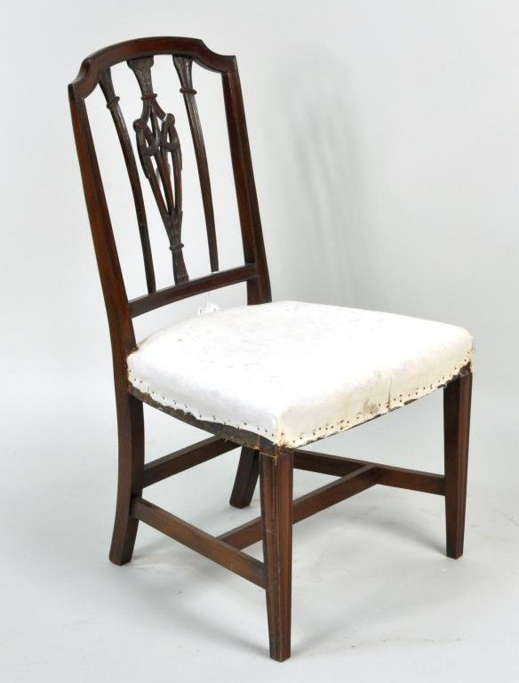 Period Hepplewhite Mahogany Side Chair: Period Hepplewhite mahogany side chair, 19th C., having a shaped crest rail over pierce carved back splat flanked by tapered side rails on tapered legs. 36 3/4" high, 21" wide, 18 1/4" deep. Condition