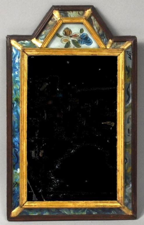 Continental Courting Mirror: Continental courting mirror, 18th C., with eglomise glass borders and floral crest. 11 3/4" high, 7 1/4" wide. Condition: mirror with silvering loss, crack to one glass panel, restoration.