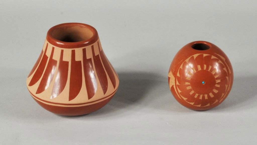 Two San Ildefonso Pots: Two San Ildefonso pots, 20th C., comprising: a feather pot signed Albert Josephine (for Albert & Josephine Aguilar) S Ildefonso, plastic label Santa Fe 1983 and a smaller pot with applied turquoise si