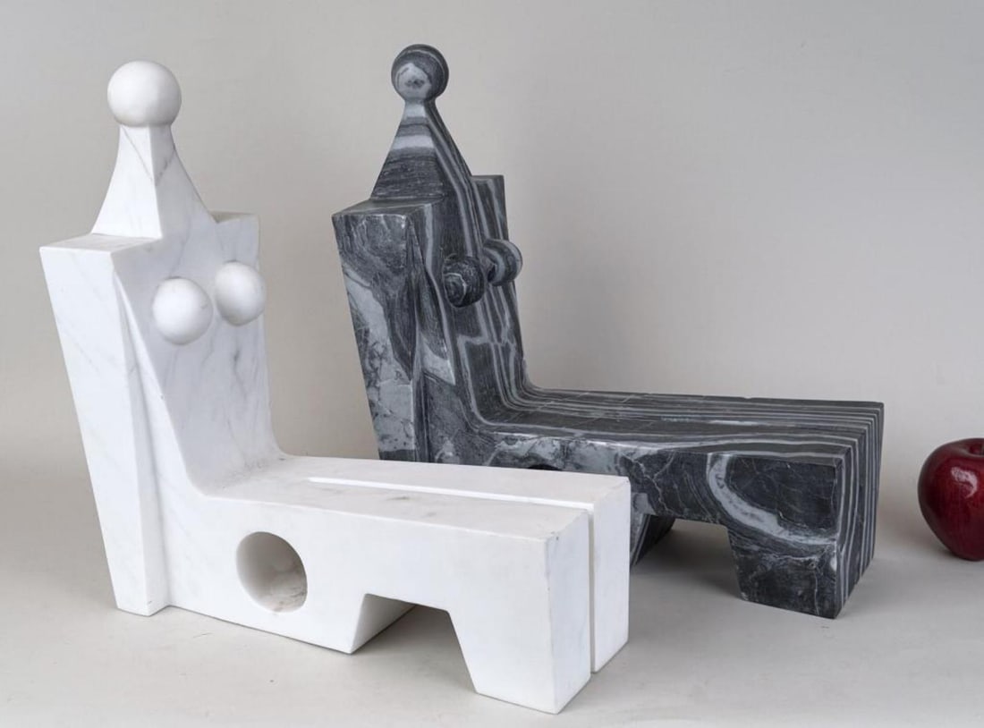 Wearstler, Two Carved Marble Figures: Kelly Wearstler (American, B. 1967), signed on base. Nude female reclining figures.14 1/2" high, 6" wide, 14" deep. Small chips.