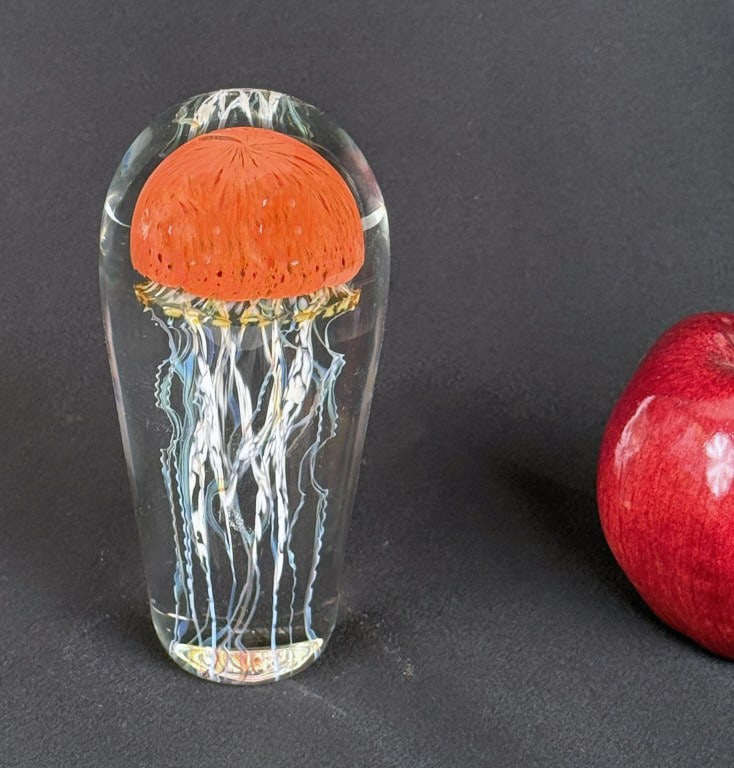 Satava Art Glass Jellyfish Paperweight: Richard Satava (American, 20th century) hand blown elongated form. 6" high, 3" diameter. Satava Art Glass Studios is located in Chico, CA.