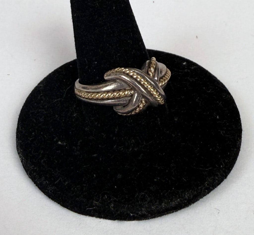 Tiffany & Co Sterling & 18K Two-Tone X Ring: approximate size 8. Signed .925 and .750. Weight: .230 OZT. Age and use wear, oxidation. *No credit card payments will be accepted for silver, gold, or jewelry from buyers that have not purchased from