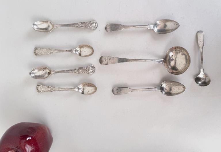 Eight Assorted English Sterling Spoons: including four matching spoons in Old English King pattern, William Summer ladle, two William Eaton teaspoons and sugar ladle. Weight: 6.380 OZT. Age and use wear, scratches, oxidation. *No credit car