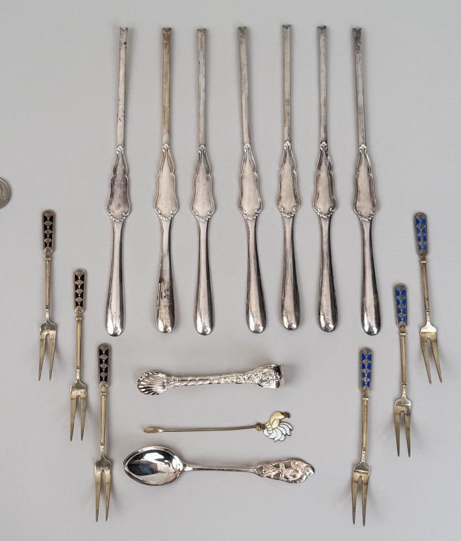 Group Sixteen Norwegian Silver Items: including seven bone marrow spoons/picks, six enameled pickle forks, sugar tongs, teaspoon and an enameled pick; includes sterling and .830 silver. Marrow spoons: 7 3/4" long. Gross weight: 7.875 OZT.