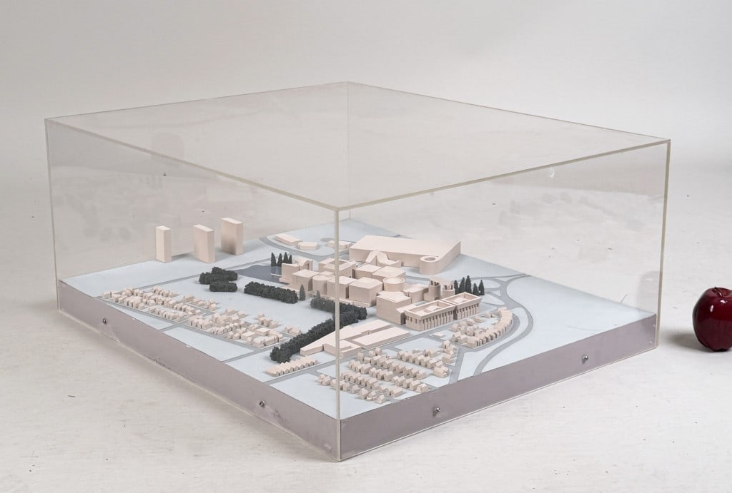 Michael Graves Cased Architectural Model: Michael Graves (American, 1934-2015) 3D model in acrylic case. 12 1/4" high, 28 3/8" wide, 23 1/2" deep. Wear to acrylic case.