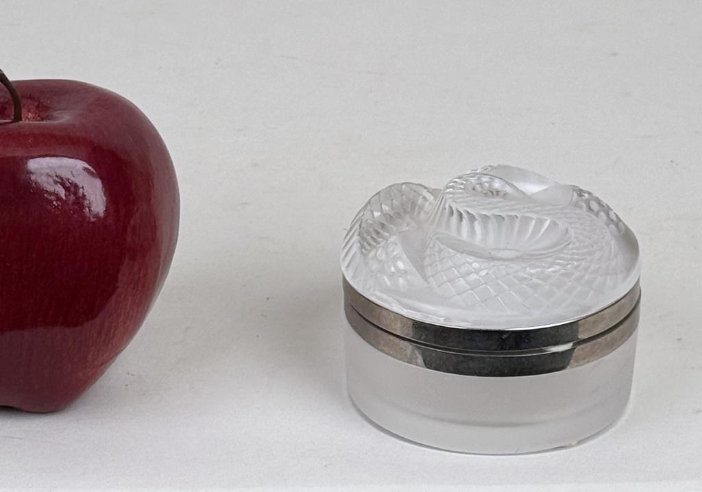 Lalique Art Glass Serpent Lidded Vanity Box: art deco style frosted glass dresser box with serpent lid and chrome mounts, signed underside "Lalique France". 2 1/4" high, 3 1/8" diameter.