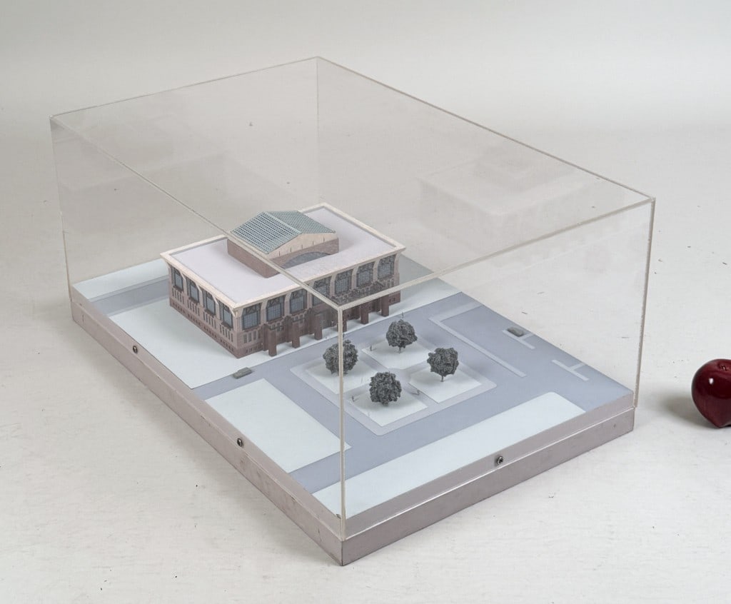 Michael Graves Cased Architectural Model: Michael Graves (American, 1934-2015) 3D model in acrylic case. 13 3/4" high, 29 3/4" wide, 19 3/8" deep. Wear to acrylic, scratches, scuffs.