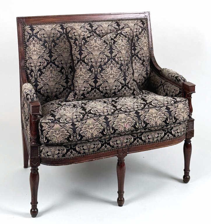 Petite French Directoire Carved Walnut Settee: exposed wood frame, turned legs. 37 3/8" high, 37 1/2" wide, 25" deep; seat height: 22" high. Small losses to wood.