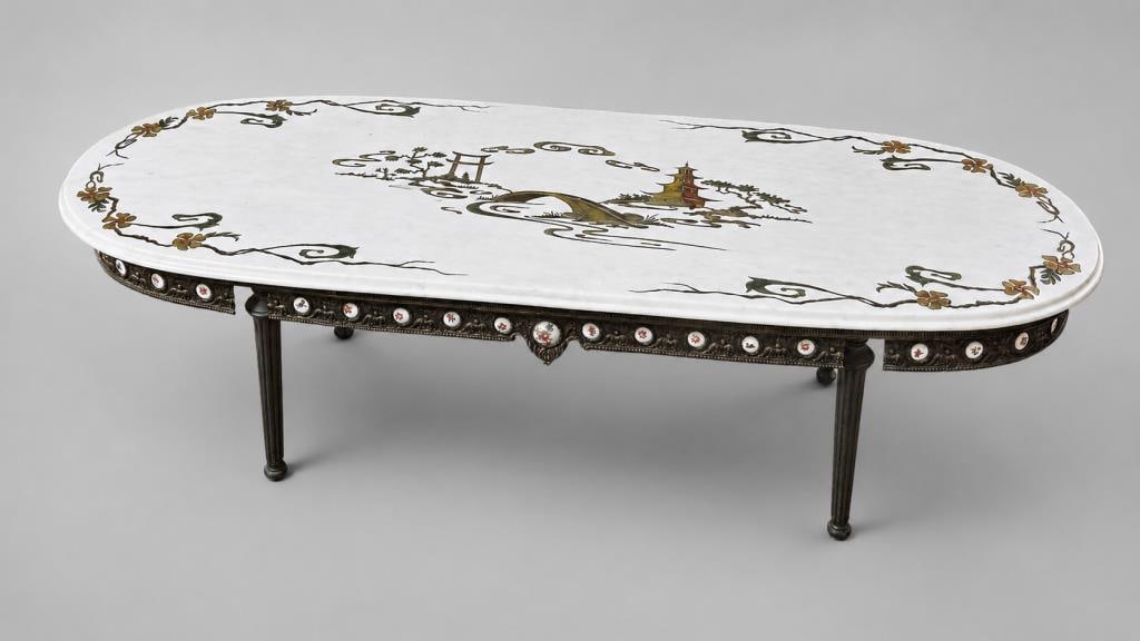 Italian Engraved M/T Chinoiserie Design Oval Table: chinoiserie engraved and gilt marble top table with Italianate metal legs and trim, round porcelain plaques around the edge. 16" high, 60 1/4" wide, 20" deep. Age and use wear.