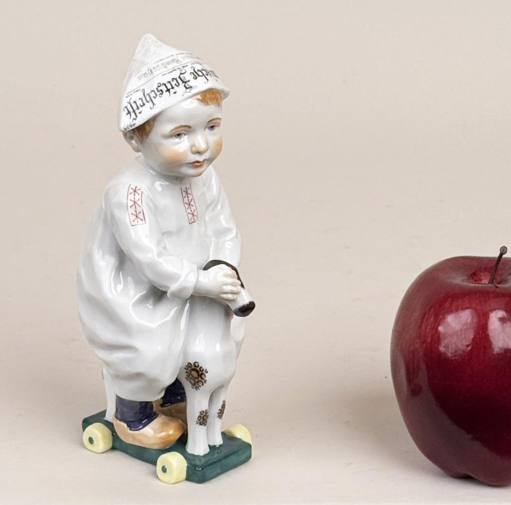 Meissen Hentschel Child Porcelain Figure: Konrad Hentschel (1872-1907) for Meissen, porcelain model of a young boy riding a hobby horse, blue crossed swords mark and numbered underside. 7 1/8" high, 3" wide, 2 1/2" deep.