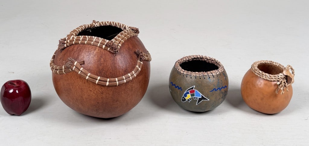 Group Three Signed Gourd Vessels: all signed at base. Comprising Helen Looman, M. Reck, and Harriet Cheek. Largest: 9" high, 10 1/4" diameter