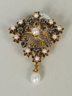 Vintage Pendant Brooch w/Seed Pearls & Sapphires: Vintage 14K pendant brooch with eleven seed pearls, seven sapphires, and pearl drop, 20th century. 1 3/4" high, 1 1/2" wide. Gross weight: 6.2 dwt.