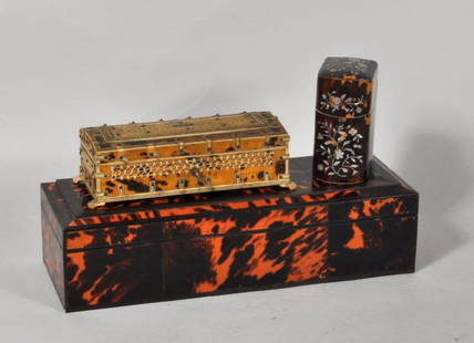 Group Three Tortoise Shell Items, 19th C.: Group of three tortoise shell items, comprising a turn of the century glove box, a small tortoise shell and ivory decorated footed box, and a miniature tortoise shell and mother of pearl inlaid tea