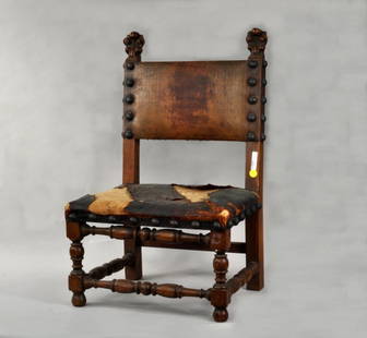 French Charles X Carved Oak Child's Side Chair: French Charles X carved oak child's side chair, 19th C., top rail with acanthus carved ends, back and seat upholstered in geometric patterned leather on turned front legs and stretchers. 25 1/2"