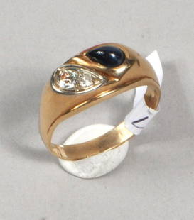 Men's 14K Gold Diamond Ring: Men's 14K gold, diamond, and blue stone ring, 20th century. Containing one round brilliant cut diamond and smaller European cut diamond and a blue cabochon stone. Band stamped 14K. Approximate size