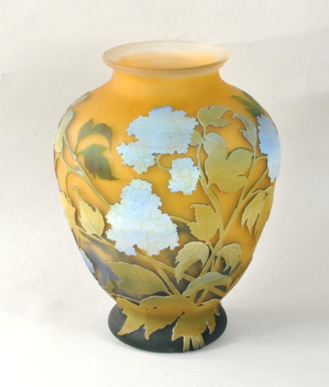 Muller Freres Luneville Cameo Glass Vase: French Muller Freres Luneville acid etched cameo glass vase, circa 1920, with raised decoration of blue hydrangeas on a peach and mottled blue ground, signed in cameo Muller Fres Luneville. 12 1/2" hi