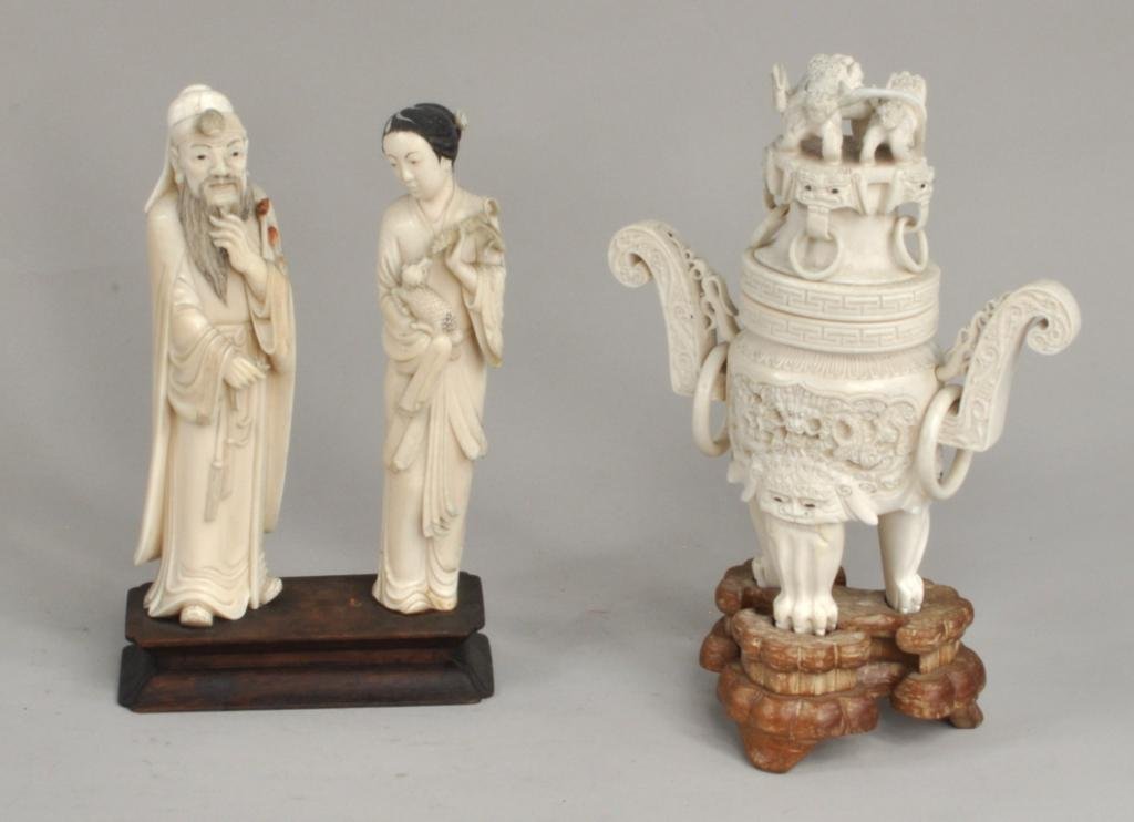 Three Chinese Carved Ivory Items: Three Chinese carved ivory items, 19th/20th century, comprising a figure with calligraphy brushes, a woman with lamb, and a dragon decorated urn. Smallest: 8" high, 1 1/2" wide. Largest: 10" high, 7 1