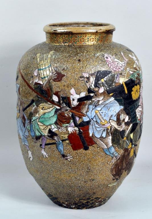 Large Japanese Decorated Stoneware Jar: Large Japanese decorated stoneware jar, circa 1900, depicting a tale in Japanese folklore, "The Fox Wedding Procession", hand painted gilt, green and red decoration around neck, body with raised ename