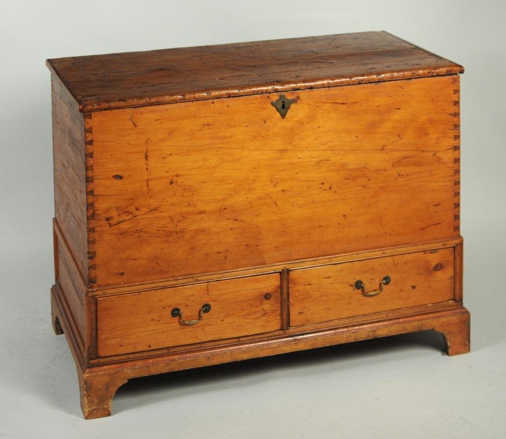 Possibly Southern Pine Two Drawer Blanket Chest: American pine blanket chest, 18th/19th century, single board top and sides above two lower drawers on bracket base. 29 3/4" high, 40" wide, 19 1/2" deep. Condition: scratches, marring, cracks, losses,
