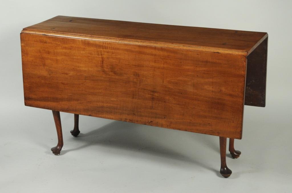 Queen Anne Maple Drop Leaf Dining Table: Queen Anne maple drop leaf dining table, 18th/19th century, square top over shaped apron on cabriole legs ending in pad feet. 27 1/2" high, 16 1/2" wide, 47 1/4" deep, open 44" wide. Condition: age cr