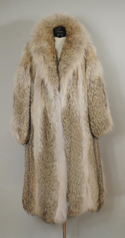 Ladies' Full Length Coyote Fur Coat: Ladies coyote fur coat, 20th century 43" long, 16" at shoulder, 21" sleeve.