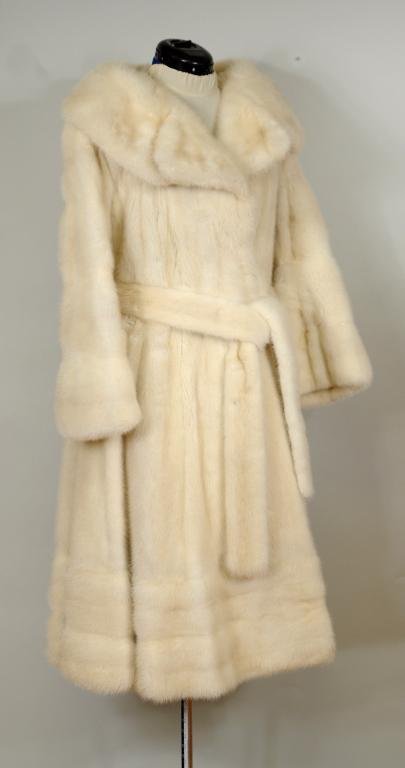 Ladies' White Mink Fur Coat/Belt: Ladies' white mink fur coat with belt, 20th century. 43" long, 16" at shoulder, 21" sleeve.