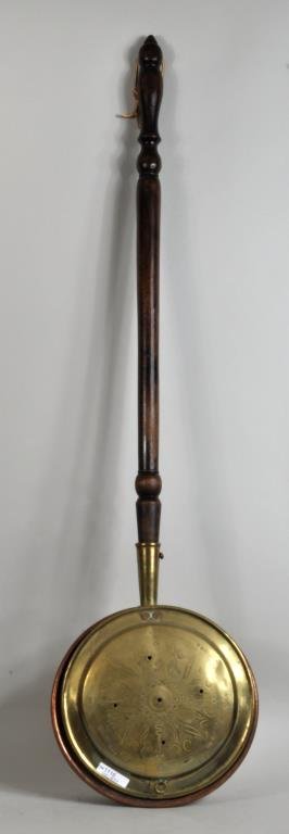 American Brass & Copper Bed Warmer: American brass and copper wood handled bed warmer, 19th century. 42 1/2" long, 11" diameter. Condition: dents, pan interior with break.