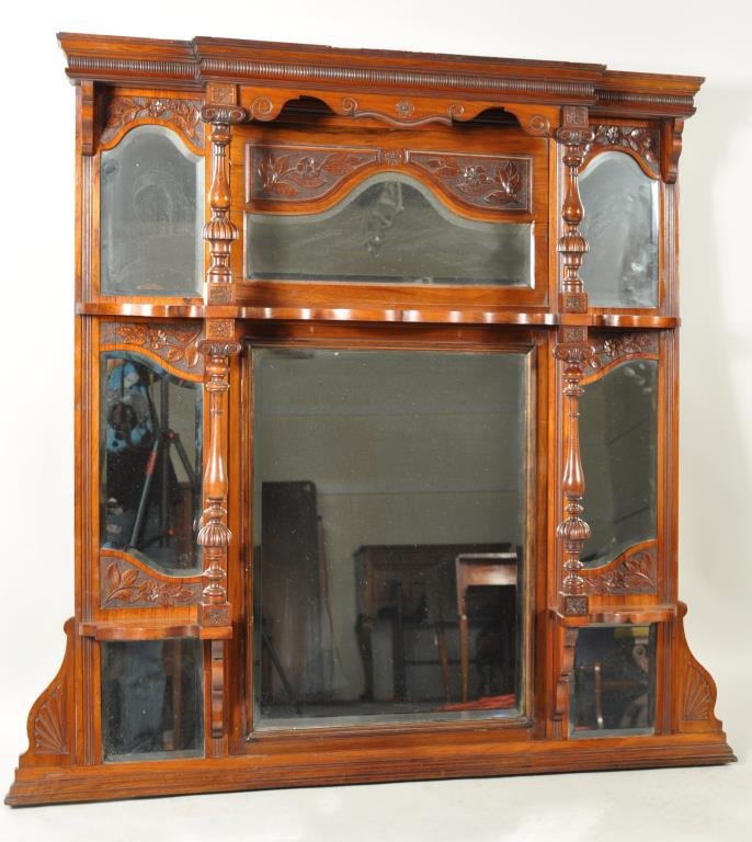 Carved Aesthetic Movement Over-Mantel Mirror: Elaborate carved aesthetic movement over-mantel mirror, 19th century, shaped cornice over central horizontal beveled arched mirror flanked by vertical arched mirrors all with floral carving above, nar