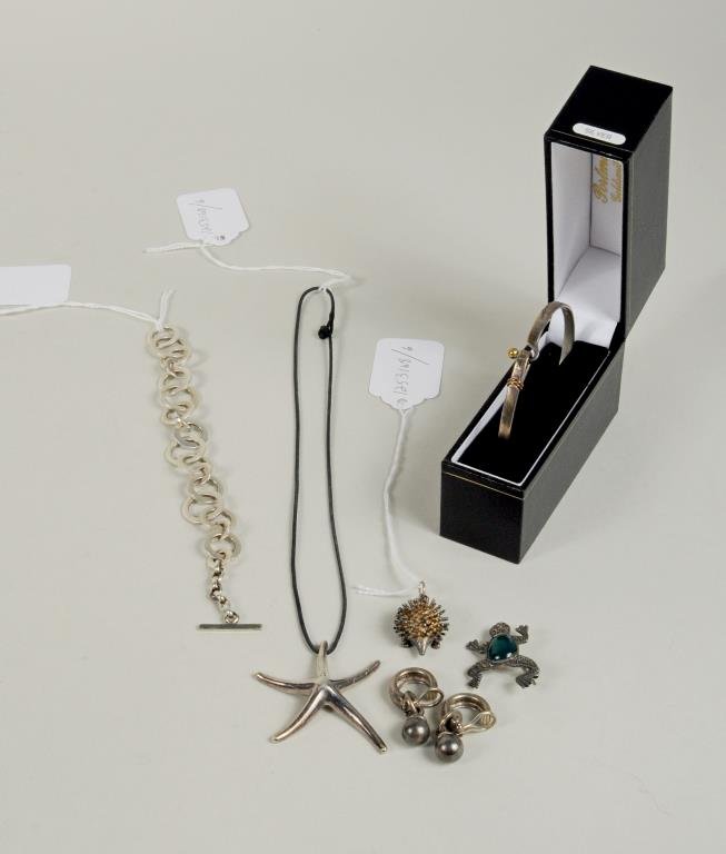 6 Sterling Items Including 3 Tiffany & Co. items: 3 Tiffany & Co. and 3 additional sterling silver jewelry items, 20th century, comprising; a Tiffany & Co. sterling bracelet with 18K gold accents and a pair of earings, an Elsa Peretti starfish pendan