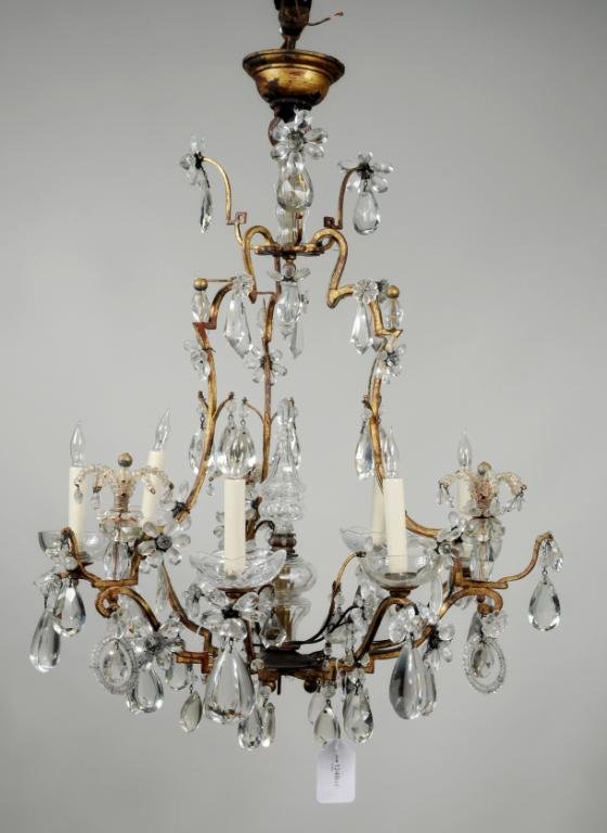 Crystal & Gilt Bronze Chandelier, Possibly Baccarat: Baccarat, of bell form with crystal flowers and drops, lower section with glass finial and glass beaded rosettes, four clear and two etched candle cups. 31" high, 23" wide. Condition: a few missing cr