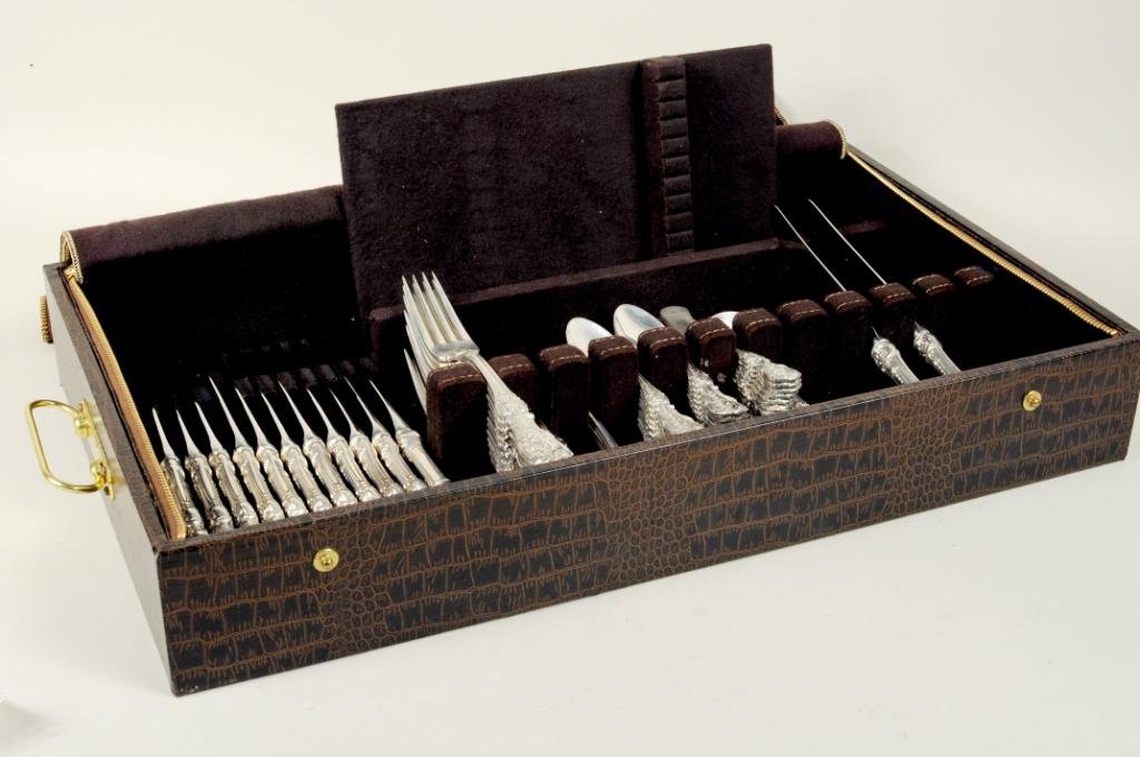 Reed & Barton Sterling Silver Flatware: Reed and Barton sterling silver partial flatware service in the "Francis I" pattern comprising twelve dinner forks, four salad forks, four seafood forks, twenty teaspoons, fourteen knives, twelve butt