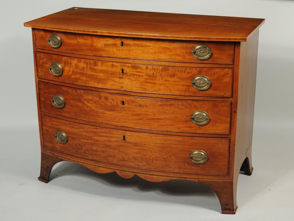Hepplewhite Inlaid Mahogany Swell Front Chest: Hepplewhite inlaid mahogany swell front chest, with inlaid top edge above four graduated long drawers and set on flaring French feet. 33" high, 41 1/2" wide, 23 1/2" deep. Condition: sun bleached, som