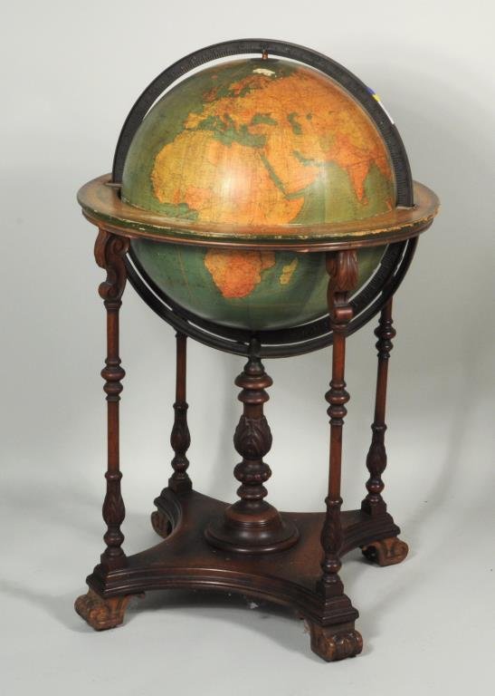 Kittinger Company Terrestrial Globe on Stand: Kittinger Company terrestrial globe on carved mahogany stand, 20th century, printed by W & A.K. Johnston, Edinburgh, Scotland. 39 1/2" high, 21" wide. Condition: stains, soiling, some losses.