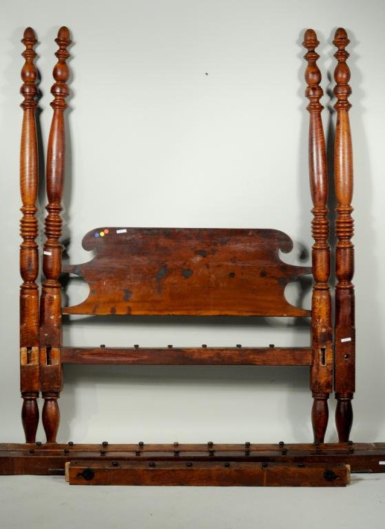 American Sheraton Tiger Maple Tall Post Bed: American Sheraton tiger maple tall post bed with acorn tops and ring turned posts. 78 1/2" high, approximately 53 1/2" wide, approximately 73" long. Condition: stains, wear, losses, holes drilled in t