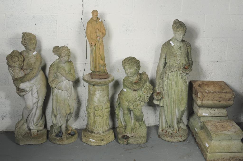 Group Classical Concrete Garden Statues: Assembled group of four classical cast concrete garden statues with bases together with St. Francis figure and an additional base. 21" high, 6" wide to 40" high, 10 1/2" wide. Condition: wear from exp